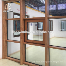 El marco de madera sólida de la venta caliente y la ventana de inclinación y giro de aluminio vienen con doble acristalamiento y Roto Hardware